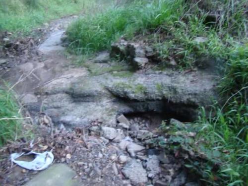 3-Hunk-of-Asphalt-dumped-in-creek